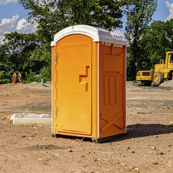 what is the cost difference between standard and deluxe portable restroom rentals in Talladega County Alabama